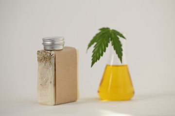 Cbd oil hemp leaf. Cannabis marijuana medicine concept