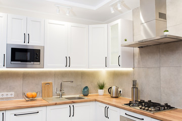 Stylish white scandinavian kitchen interior with decor accessories