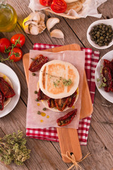 Tigella bread with sun-dried tomatoes.