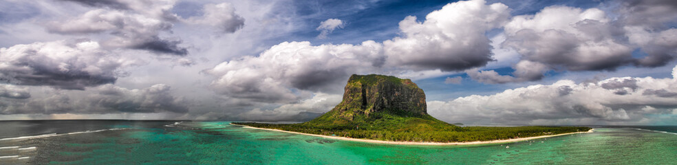 Naklejka premium Le Morne Brabant in Mauritius. Amazing aerial view of beach, forest and mountain