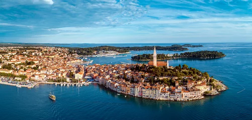 Fotobehang Beautiful Rovinj - aerial view panorama taken by a professional drone from above the sea. The old town of Rovinj, Istria, Croatia © concept w