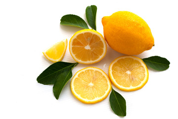 fresh lemon with lime and leaves isolated on white background