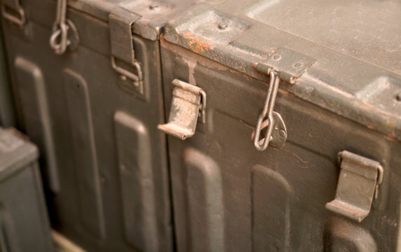Closeup view of locking mechanism of old military or ancient metal box used in field                 