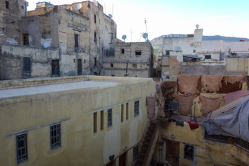 Leather dying in a traditional tannery in the medina of Fes, Morocco