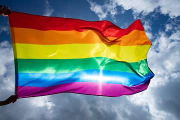 Colorful LGBT flag blows in the breez.