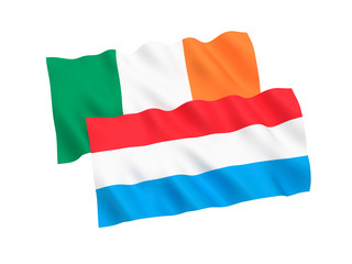 National fabric flags of Luxembourg and Ireland isolated on white background. 3d rendering illustration. 1 to 2 proportion.
