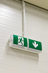 Naklejka premium Emergency luminaire with green information table.