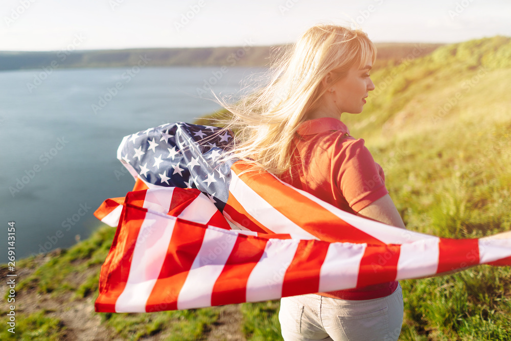 Sticker Patriotic holiday. Young woman holding USA flag.