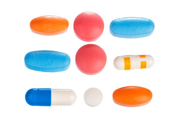 colorful pills isolated on white