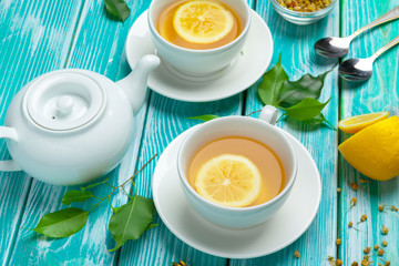 healthy herbal tea over blue background