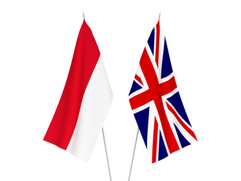 National fabric flags of Great Britain and Indonesia isolated on white background. 3d rendering illustration.