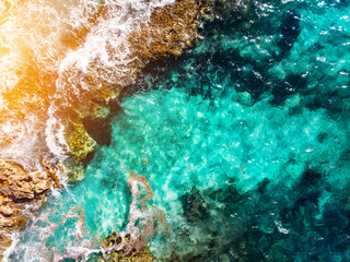Fototapeta na wymiar Blue sea coast on island, top view aerial