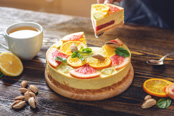 Raw citrus cake with grapefruit, orange, lime and lemon. Healthy summer dessert. Gluten free, no baking vegan food