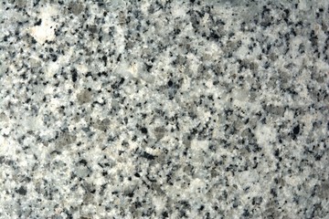  details of the surface of a light granite slab