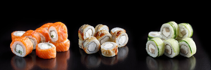 Classic sushi roll. Sushi at black background.Japanese seafood sushi , sushi a black background.