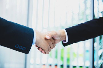 business people handshaking after good deal