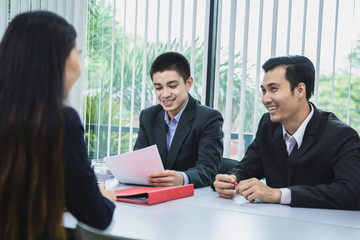 asian businesswoman candidate present her profile application on job interview