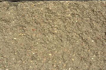 rough concrete wall with traces of erosion