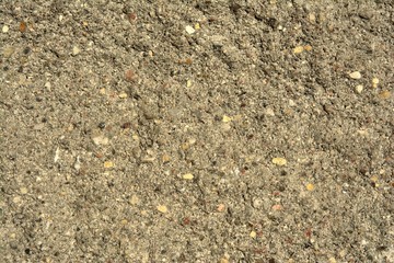 rough concrete wall with traces of erosion