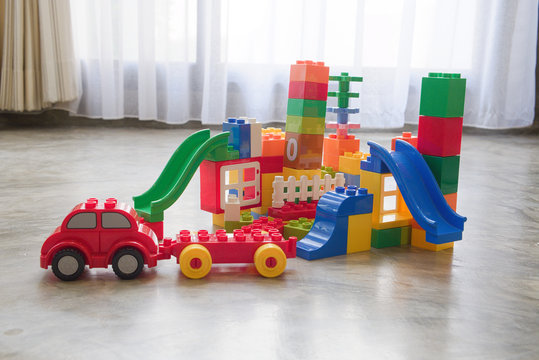 Colorful plastic toys for children to create an amusement park and an imaginary city.