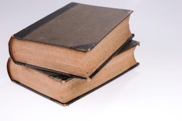 Obraz premium Two old books on white. Old publication. White isolated background