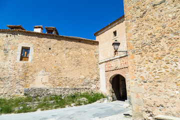 Fototapeta na wymiar Pedraza, Castilla Y Leon, Spain: Puerta de la Villa, the entry gate of the small town. Pedraza is one of the best preserved medieval villages of Spain, not far from Segovia