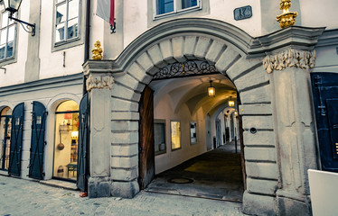 Fototapeta na wymiar Huge stony archway to the Mozart's house in Linz, Austria