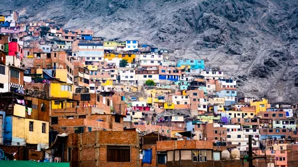 Fotobehang Different colorful slum buildings in Lima, Peru © Ievgen Skrypko