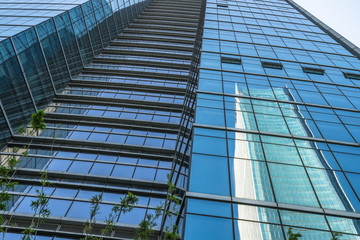 Urban abstract - windowed corner of office building.