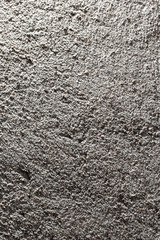 Wall of sand and concrete as an abstract background