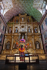 Fototapeta na wymiar Ornate decor at Santa Clara church (constructed in 1647), Bogota, Colombia