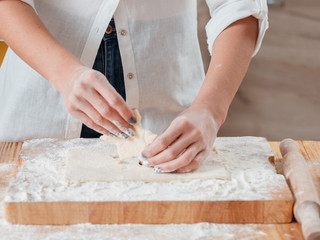 Bakery food and pastry. Biscuit cooking hobby. Closeup of female hands making cookies with homemade dough.