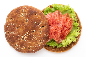 Sandwich with ham sausage on white background.