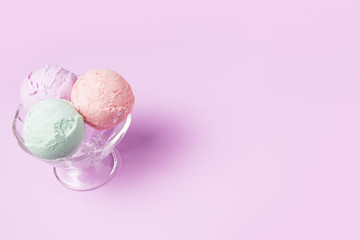 Ice cream balls on glass bowl