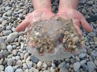hand with stones