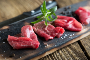 Thinly sliced beef pieces. beef carpaccio