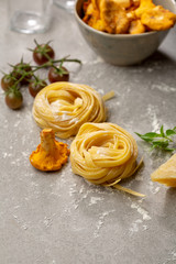 Raw pasta and fresh mushrooms. food close-up