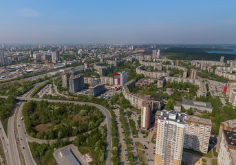 Fototapeta na wymiar Top down aerial drone image of a Ekaterinburg city in the end of spring, backyard turf grass and trees lush green
