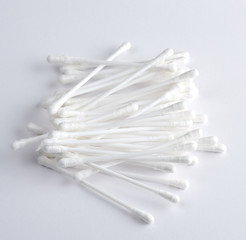 plastic sticks with white cotton for ear cleaning and other hygiene procedures