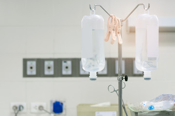 Fototapeta na wymiar Saline IV drip for patient and Infusion pump in hospita