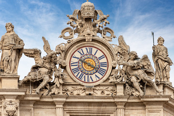 Basilica of Saint Peter - Clock and Coat of arms of the Vatican city