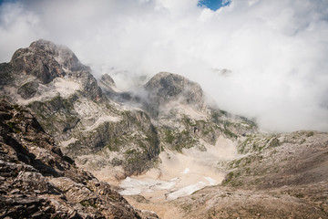 Clouds in the mountains. Beautiful summer Mountain landscape view.  the northern part of Abkhazia,  the Caucasus Mountains. Arabica Mountains