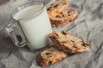 closeup view on a glass cup of milk and Cookies biscotti