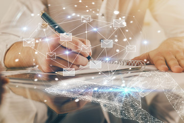 Polygonal hands using tablet with abstract e-mail network. Communication concept. Double exposure.