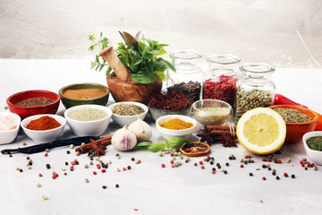 Spices and herbs on table. Food and cuisine ingredients with basil