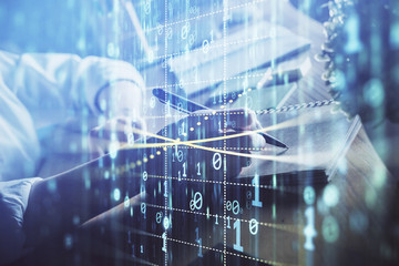 Multi exposure of woman's hands on background with technology and digital coding icons. Data development concept.
