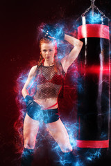 Woman sportsman boxer doing boxing training at the gym. Girl wearing gloves, sportswear about...