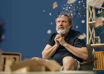Drown image of losing of mind. Old bearded man with alzheimer desease suffering from panic attack...