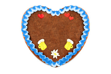 Oktoberfest Gingerbread heart cookie with ornaments and copy space