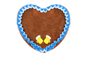 Oktoberfest Gingerbread heart cookie with ornaments and copy space